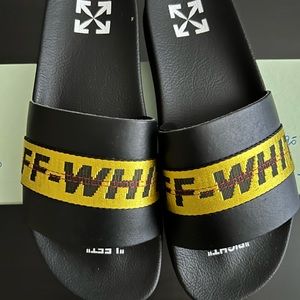 Off white rubber men’s slides . Size 45 never worn brand new
